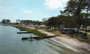 Waterfront RV sites at Tom's Cove Park on Chincoteague Island, close to Pony Penning Week events and Assateague beaches.